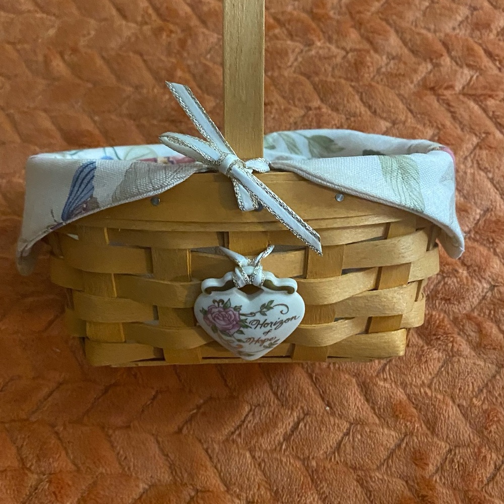 Small Horizon of Hope Longaberger Woodcraft Basket with Lid.